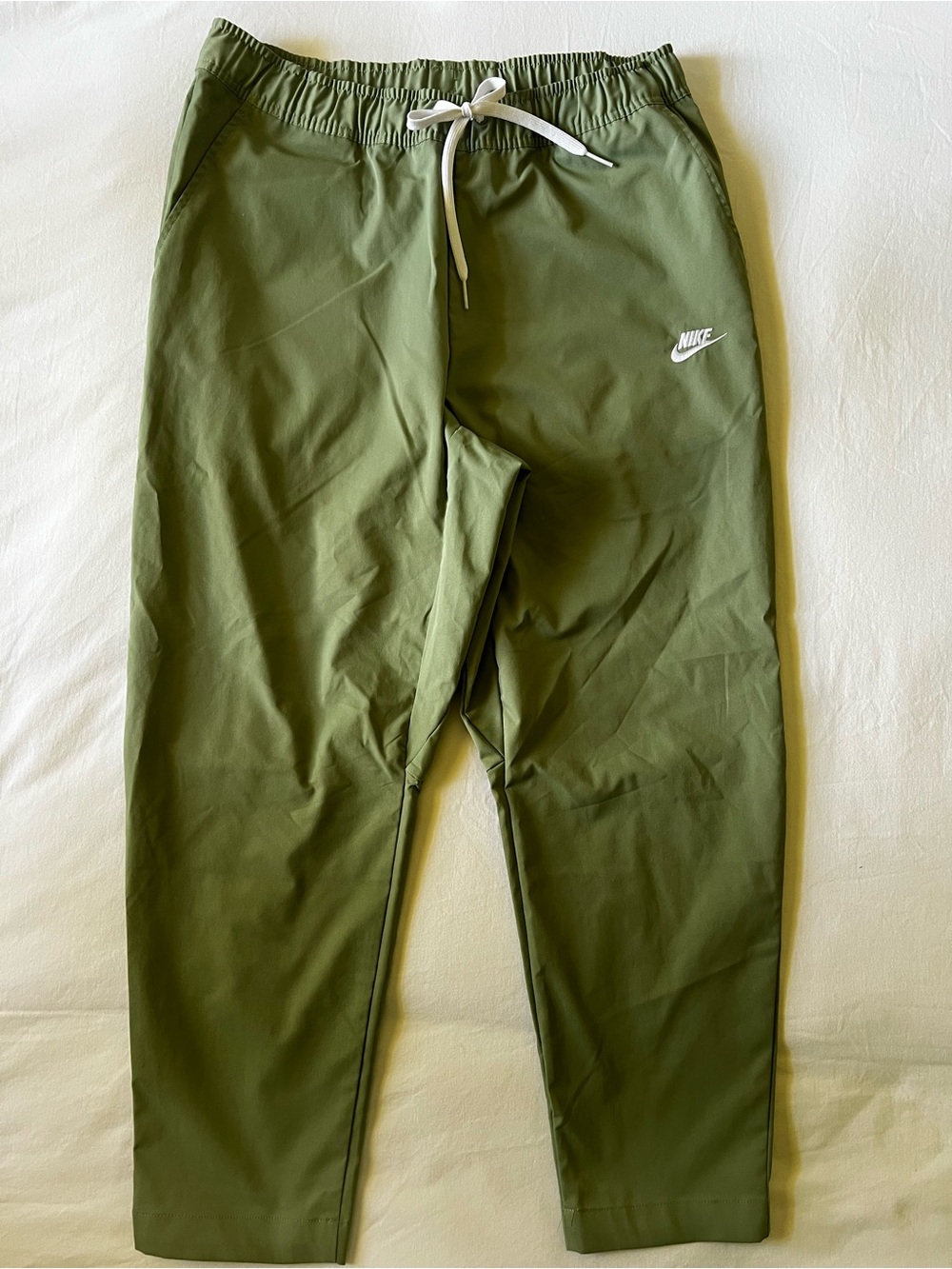 Nike Men's Olive Green Athletic Joggers with White Drawstring